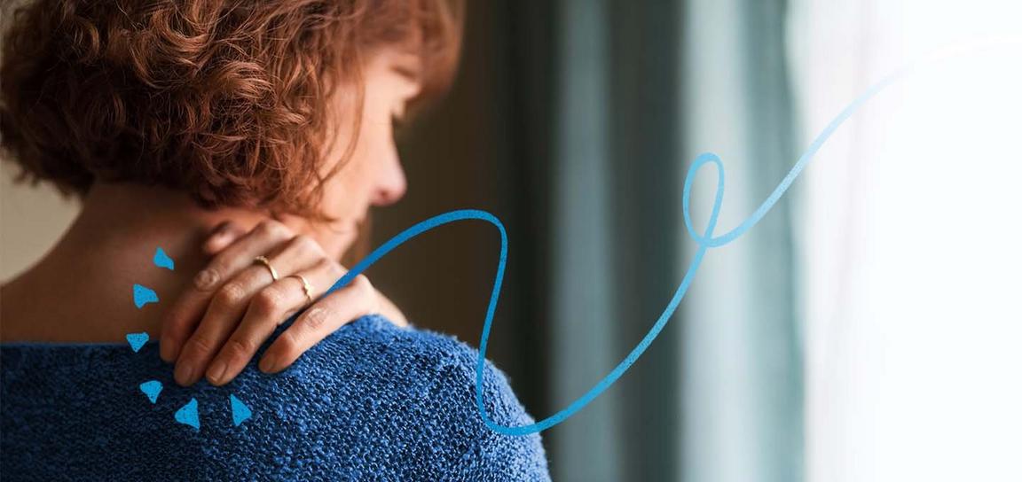 A person holding with shoulder in pain