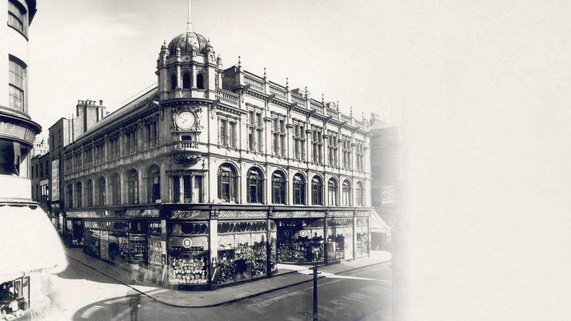 A black and white image of an old Boots store in Nottingham