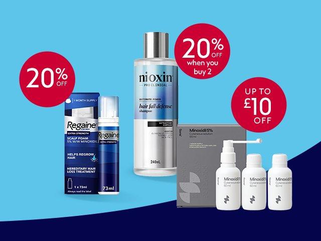 Four hair loss products on a blue background