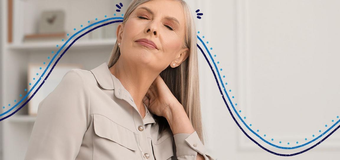 A woman stood with her eyes closed holding the back of her neck